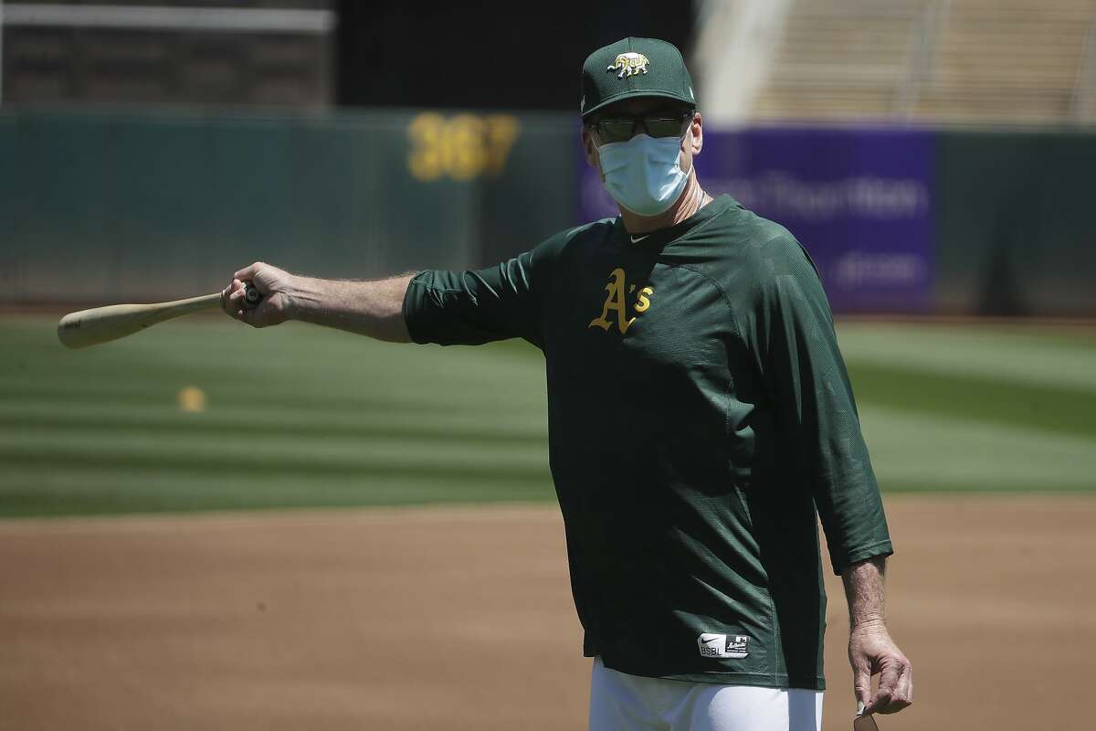 Oakland Athletics manager Bob Melvin gestures during a baseball practice in Oakland, Calif., Saturday, July 4, 2020. (AP Photo/Jeff Chiu)
