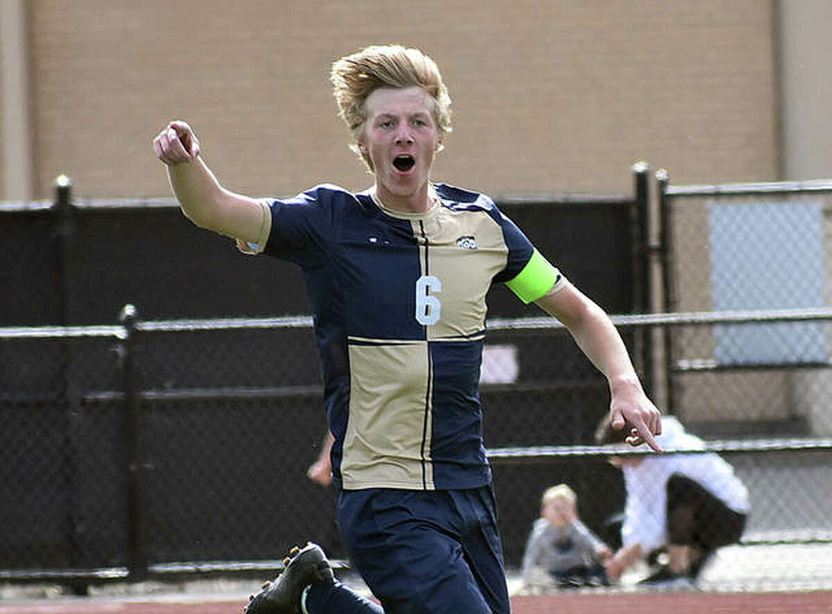 Father McGivney’s Jonah Mitan shouts to the bench after scoring in the 51st minute against Althoff in the Class 1A Althoff Regional championship game in Belleville.