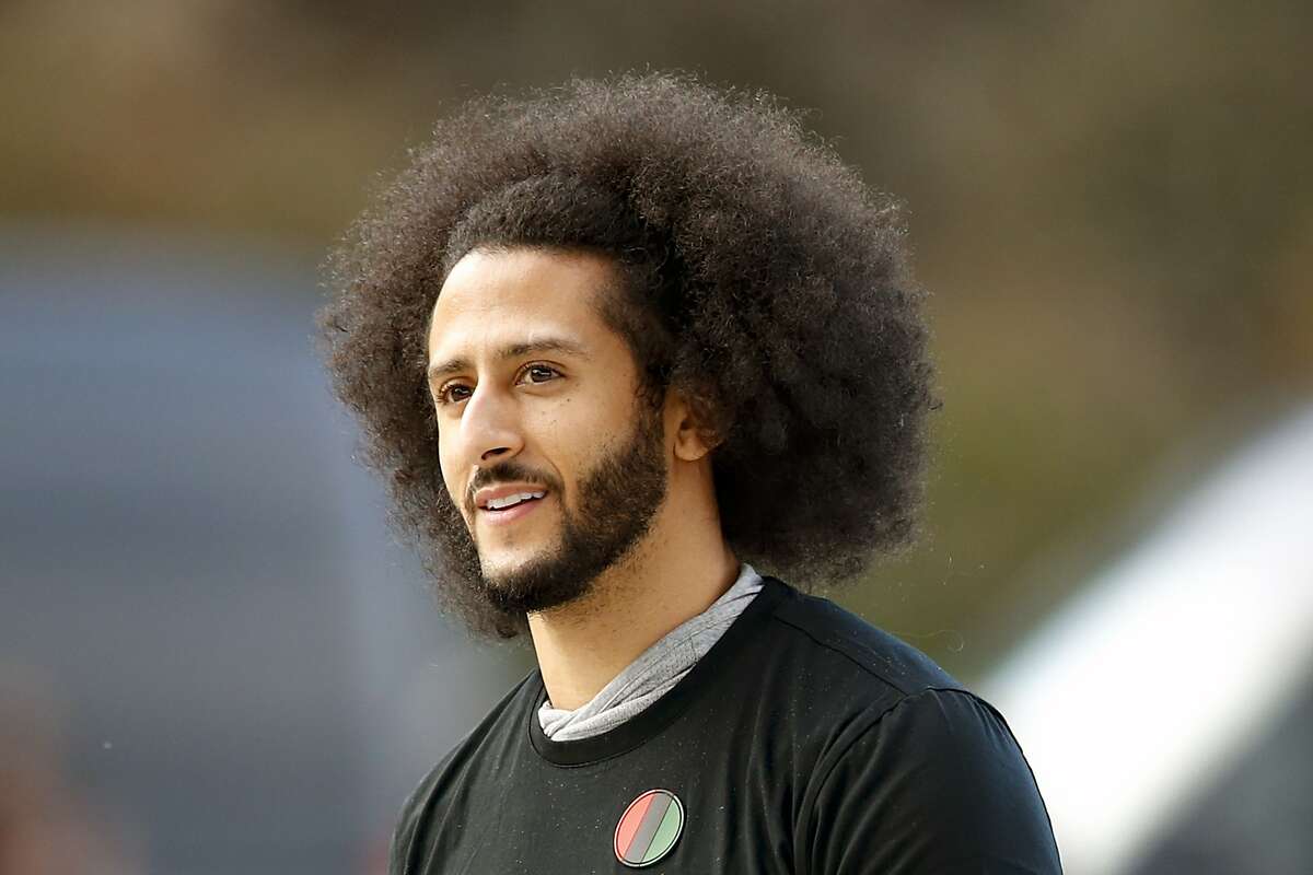 FILE - In this Nov. 16, 2019, file photo, free agent quarterback Colin Kaepernick arrives for a workout for NFL football scouts and media in Riverdale, Ga. Colin Kaepernick will be featured in an exclusive docuseries produced by ESPN Films as part of a first-look deal with The Walt Disney Co. The deal between Kaepernick’s production arm, Ra Vision Media, and The Walt Disney Company was announced Monday, July 6, 2020. (AP Photo/Todd Kirkland, File)