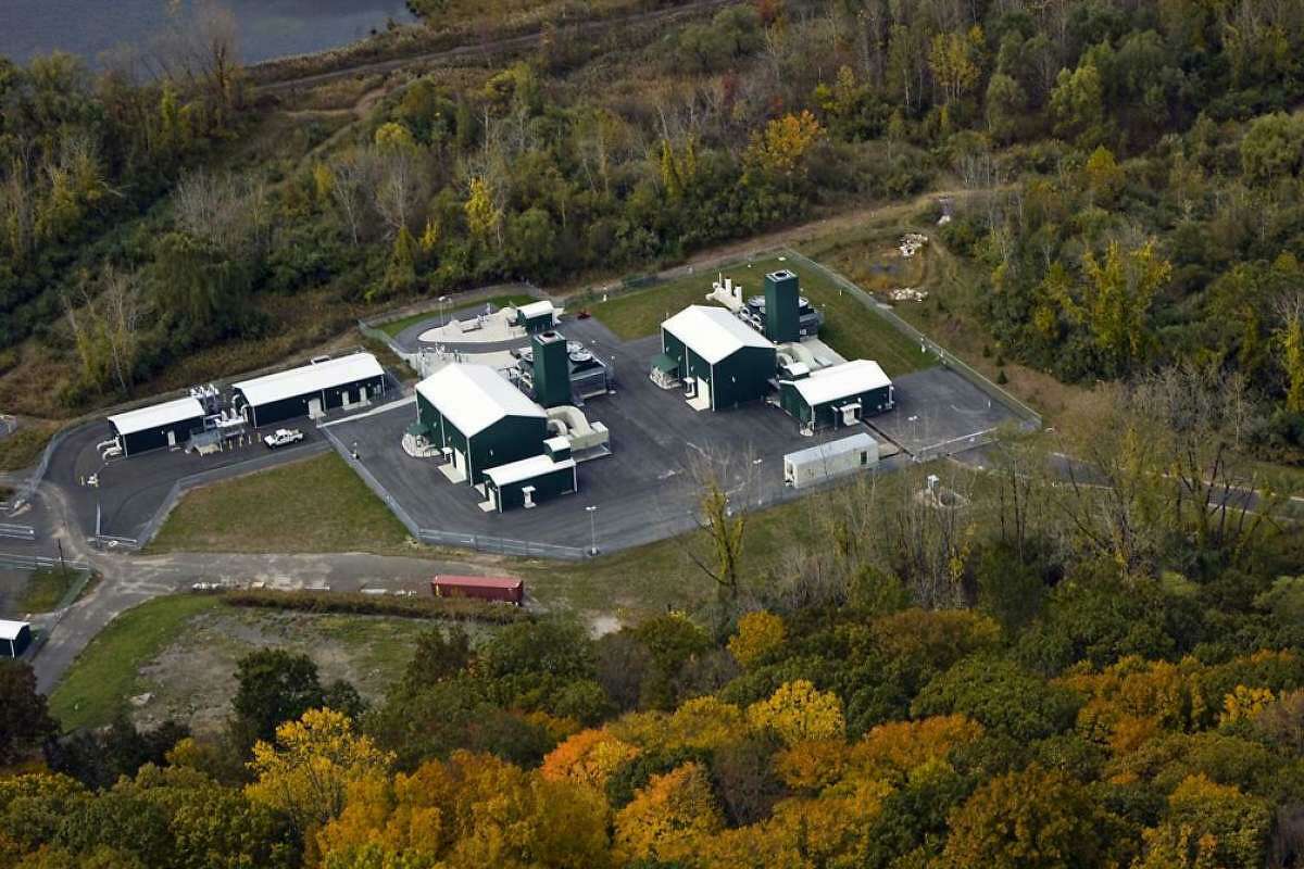 A natural gas compressor station in Brookfield, Conn., part of the Iroquois Gas Transmission system in which Berkshire Hathaway is acquiring a 50 percent stake from Dominion Energy.
