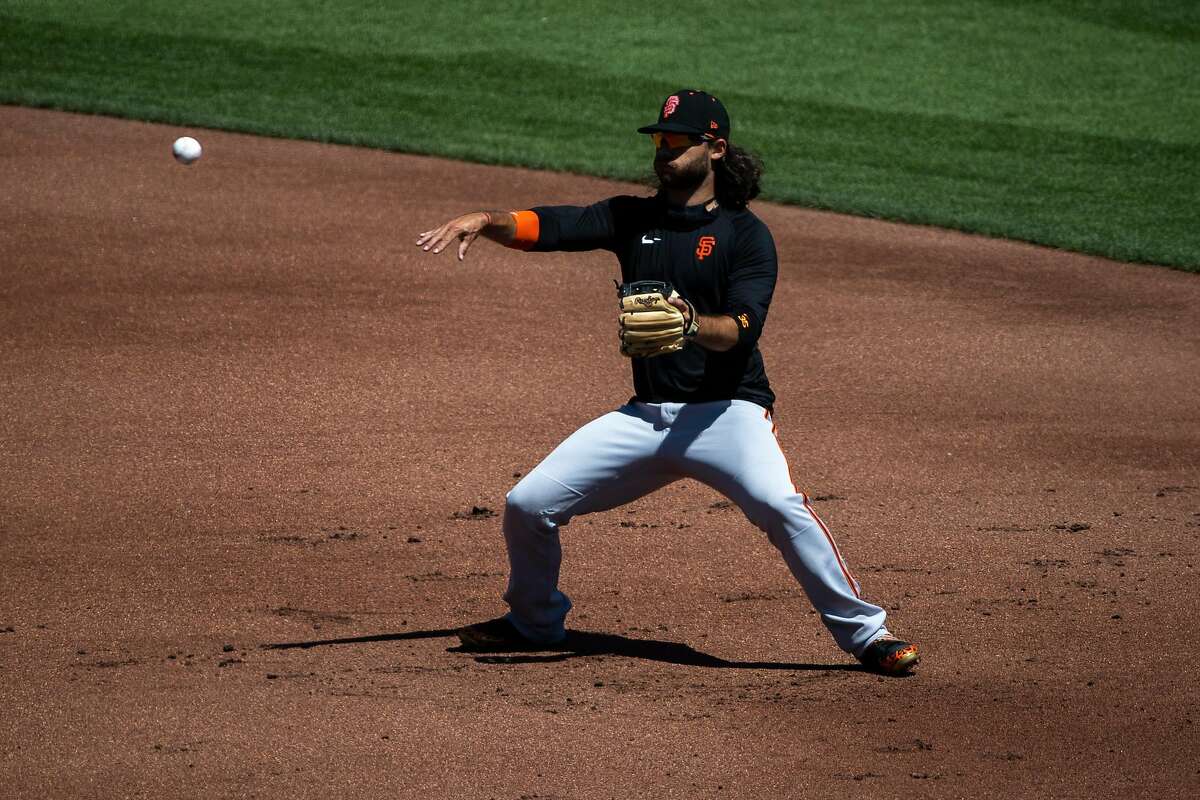 Brandon Crawford #35 of the San Francisco Giants makes a throw during summer training camp at Oracle Park in San Francisco, Calif. on Monday, July 6, 2020.