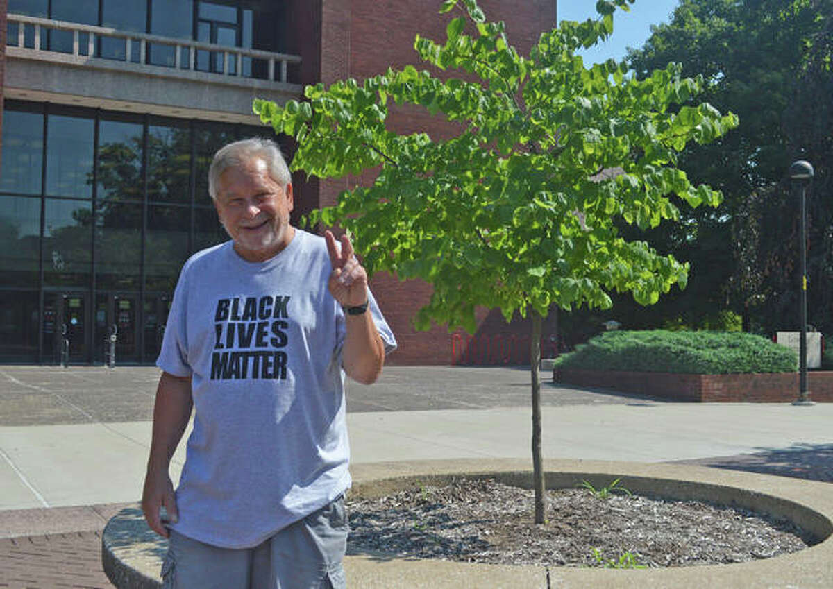 Greg Mudge poses in front of the Lovejoy Library on the SIUE campus. Fifty years ago, Mudge was among the student protesters at SIUE after four students at Kent State University were shot and killed by the Ohio National Guard