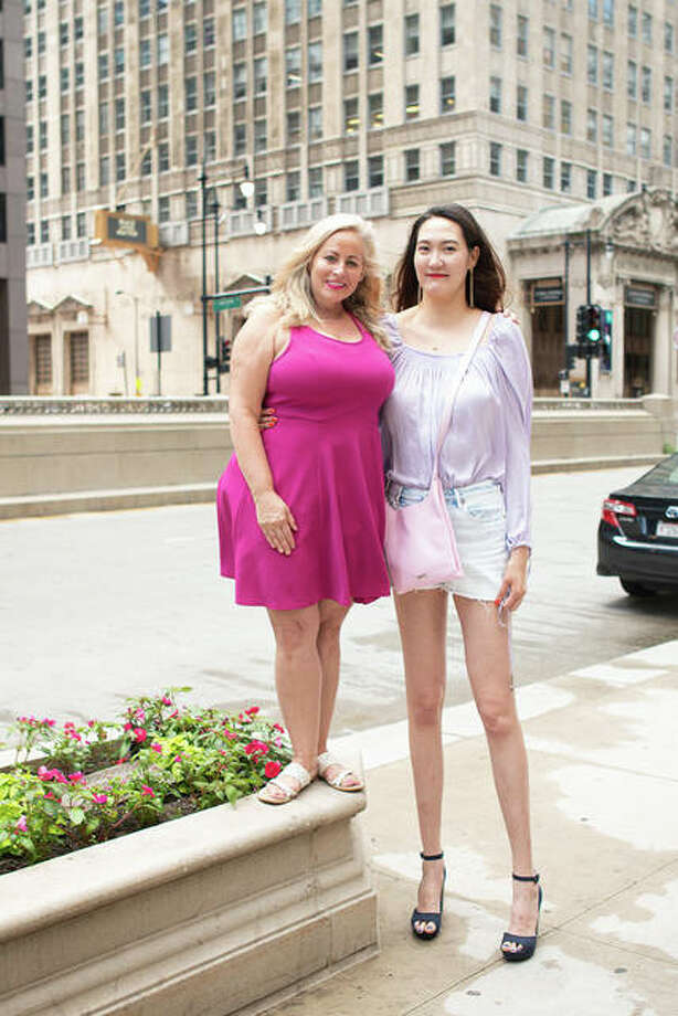 Rentsenkhorloo Bud of Chicago stands 6 feet, 9 inches tall and her legs alone measure an astonishing 52.8 inches; the same as a 4 foot, 3 inches tall person. Photo: Istvan Lettang | Barcroft Media Via Getty Images