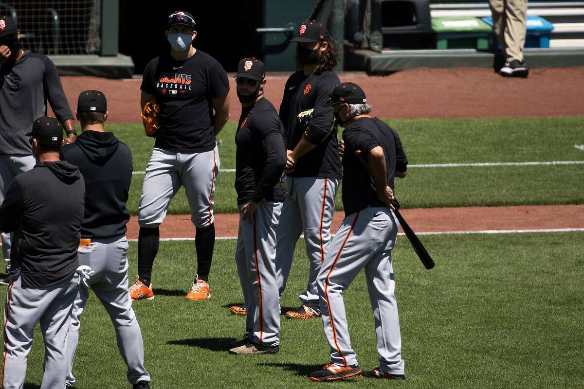 Manager Gabe Kapler of the San Francisco Giants, center, is seen during summer training camp at Oracle Park in San Francisco, Calif. on Monday, July 6, 2020.
