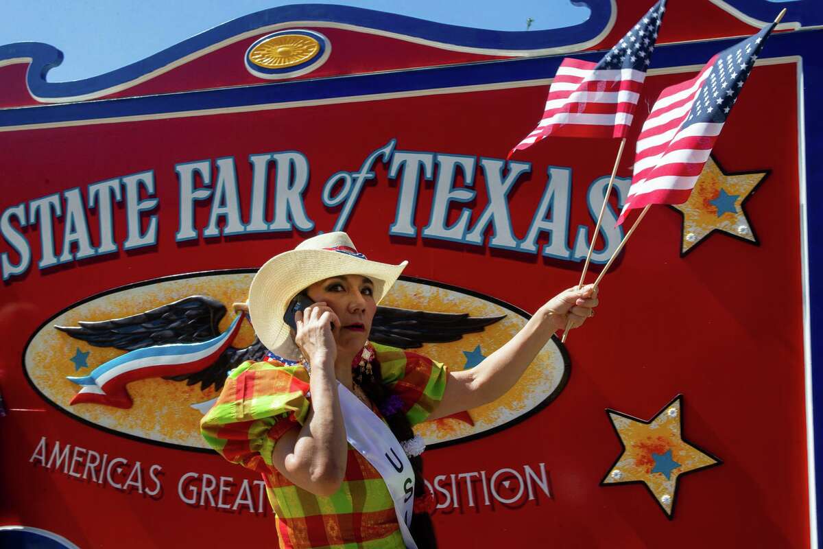Henny Hughes directs the line-up for the opening day parade at the State Fair of Texas in September 2019.