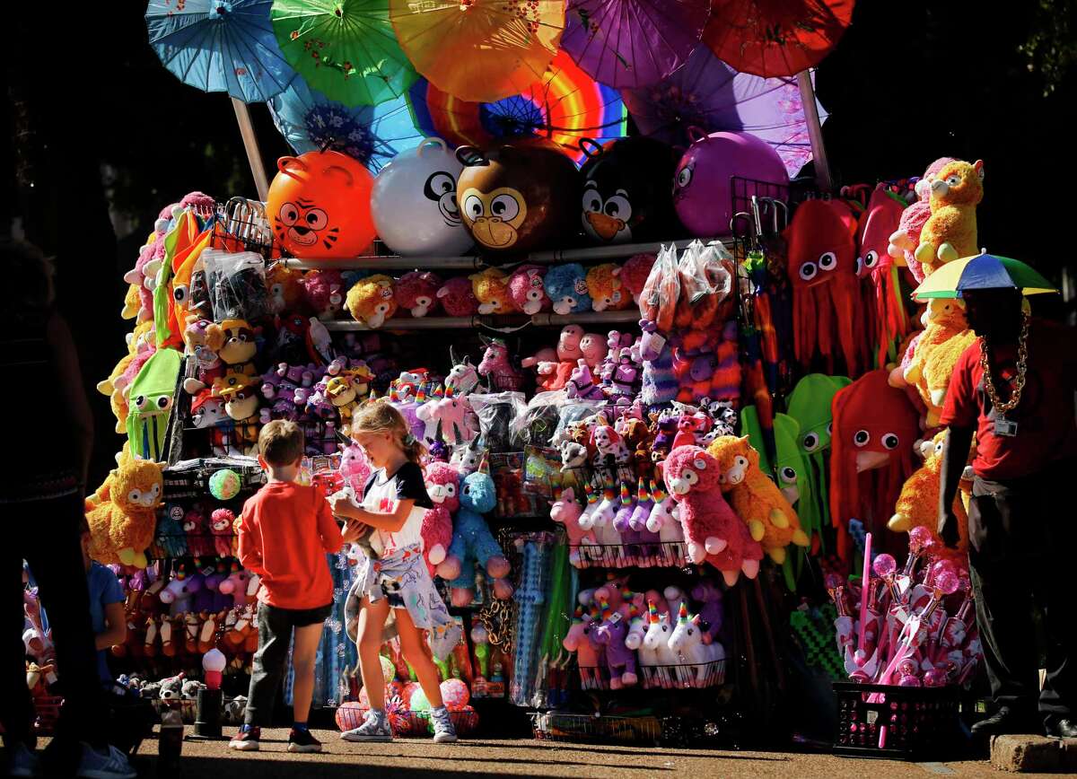 Stuffed toys fill a vendor stand at the State Fair of Texas in October 2019.