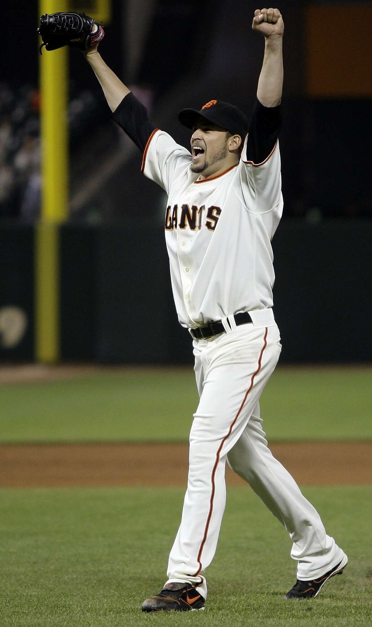 San Francisco Giants' Jonathan Sanchez celebrates at the end of a baseball game after pitching a no-hitter against the San Diego Padres Friday, July 10, 2009, in San Francisco. Sanchez pitched the majors' first no-hitter this season Friday night, dominating the San Diego Padres with an array of pitches in the San Francisco Giants' 8-0 victory. Sanchez finished with 11 strikeouts and no walks. (AP Photo/Ben Margot)