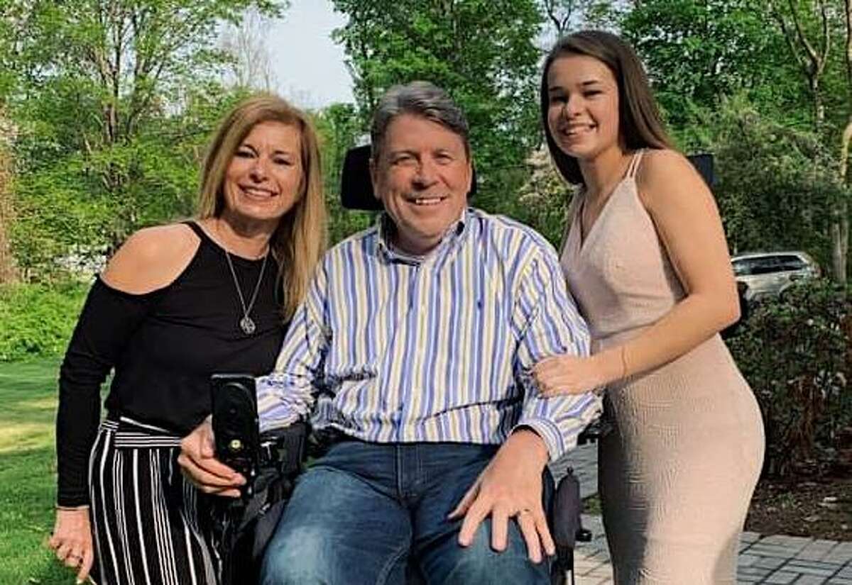 Wilton High School senior Kelsey Rhodes, right, is joined by Alison and Greg Jacobson on the occasion of her winning the Elizabeth Sternad Scholarship presented by the Wilton Woman's Club.