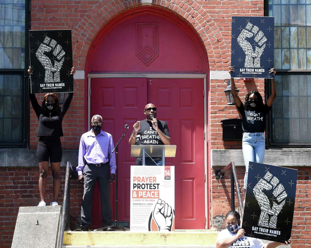 The Rev. Kelcy G.L. Steele speaks at a Prayer, Protest & Peace March in front of the Varick Memorial AME Zion Church in New Haven on June 14, 2020.