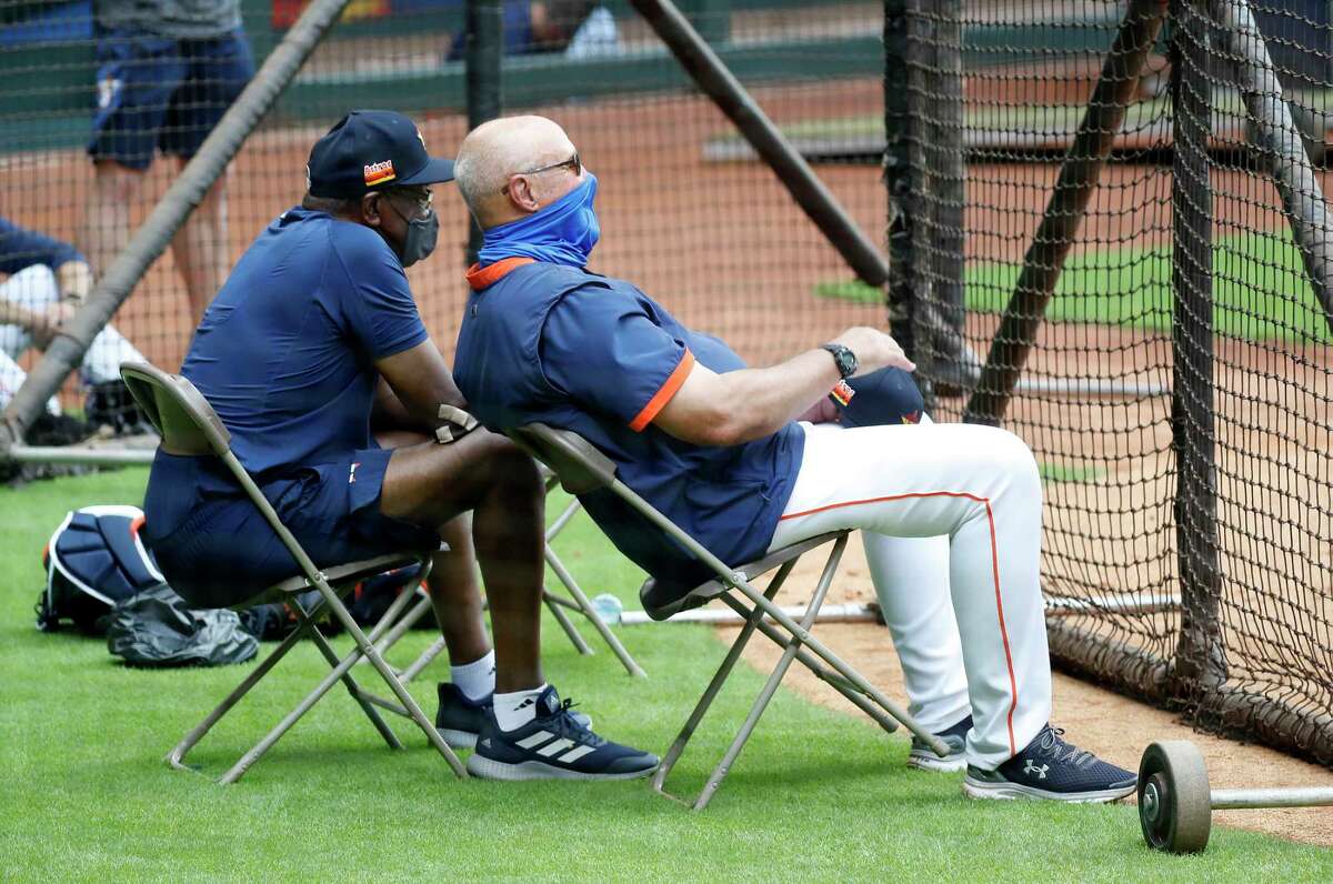 Should the Astros make the playoffs, manager Dusty Baker (left) and pitching coach Brent Strom will have to navigate a compressed postseason schedule with limited off days.