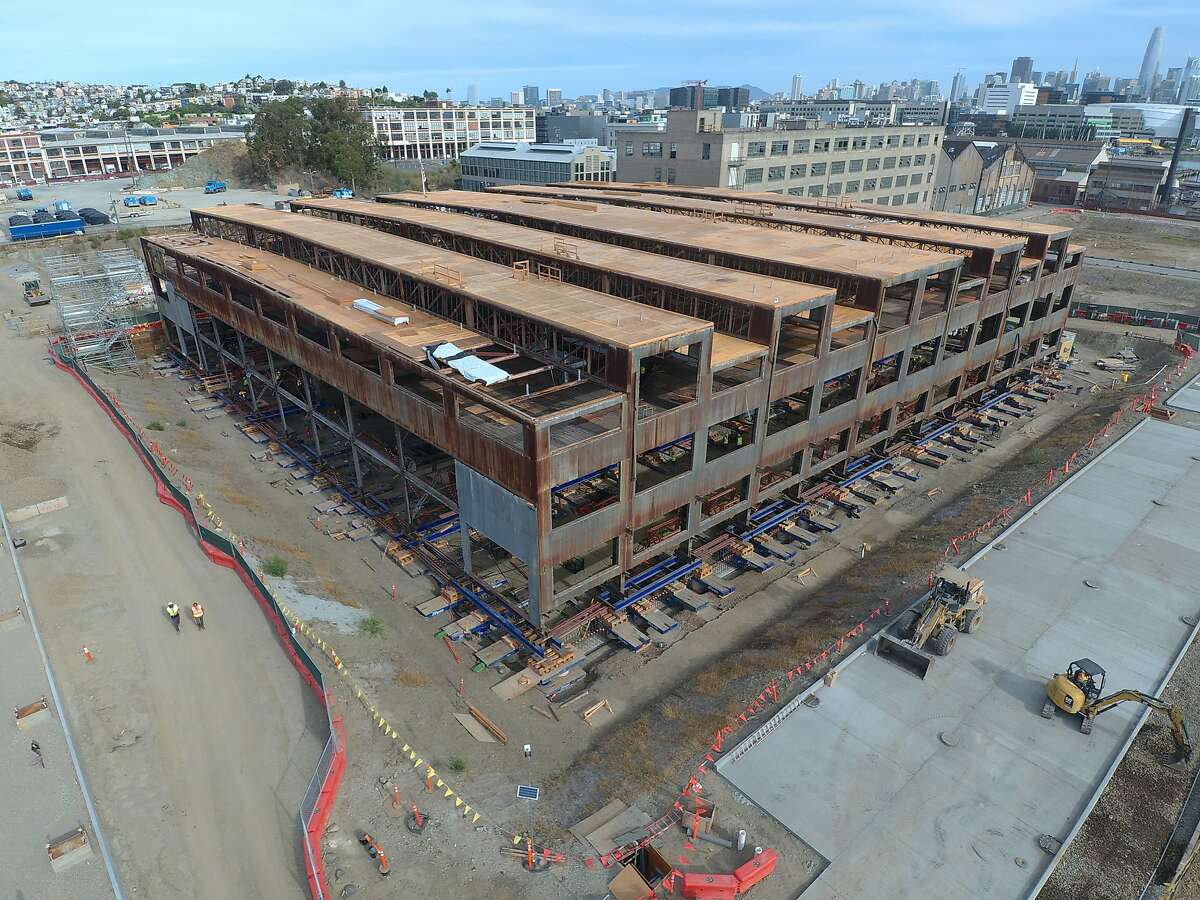 Historic Building 12 at Pier 70 is being lift 10 feet for sea level rise protection. Building 12 will be at the same level as the new roads pictured here.