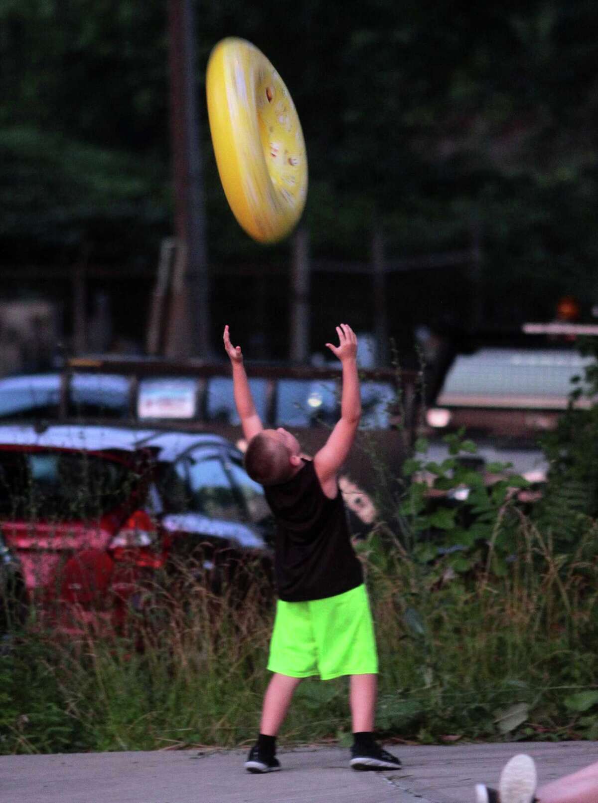 The July 4th holiday fireworks display is held at Veterans Memorial Park in Shelton, Conn., on Wednesday July 8, 2020. Due to the coronavirus pandemic, crowds weren't allowed to gather in the park, but were able to watch from the roads and homes nearby.