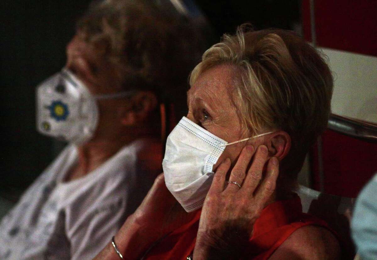 The July 4th holiday fireworks display is held at Veterans Memorial Park in Shelton, Conn., on Wednesday July 8, 2020. Due to the coronavirus pandemic, crowds weren't allowed to gather in the park, but were able to watch from the roads and homes nearby.