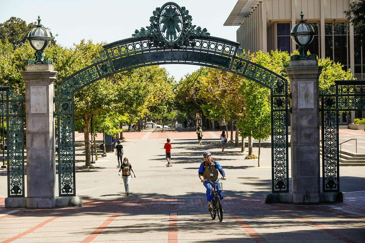 People walk through the UC Berkeley campus on Wednesday, July 8, 2020 in Berkeley, California.