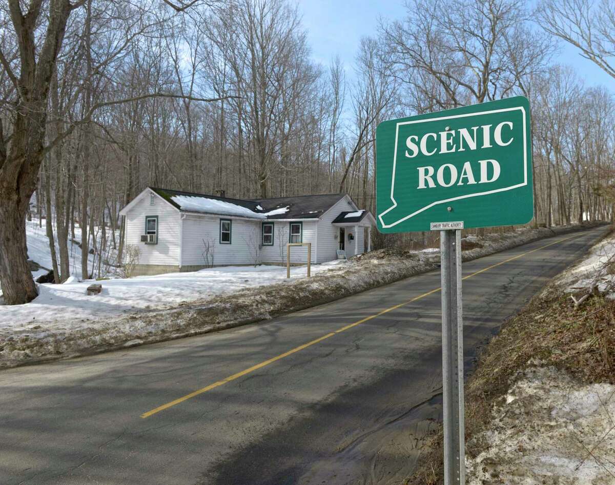 A neighborhood association opposes the plan by Writer's Institute of selling an 18-acre property to an unaffiliated church group. They believe that the church would represent much more traffic and disruption than the current use. Wednesday, March 11, 2015, in Danbury, Conn. A scenic road sign identifies Long Ridge Road as the only scenic road in Danbury.