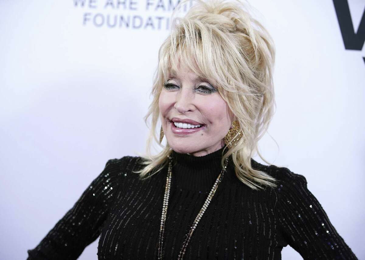 Dolly Parton One of the greatest rags-to-riches stories in show business history is Dolly Parton growing up in rural poverty in the tiny mountain enclave of Locust Ridge in Eastern Tennessee. The fourth of 12 children, she was born in a one-room cabin and was raised poor. But she was raised in a happy atmosphere that centered around her family, community, and faith. She has repeatedly commented that her upbringing was the driving force behind her remarkable career, which lands her in a tiny and exclusive club of entertainers who have received at least one nomination for all four major awards: an Oscar, a Tony, an Emmy, and a Grammy.
