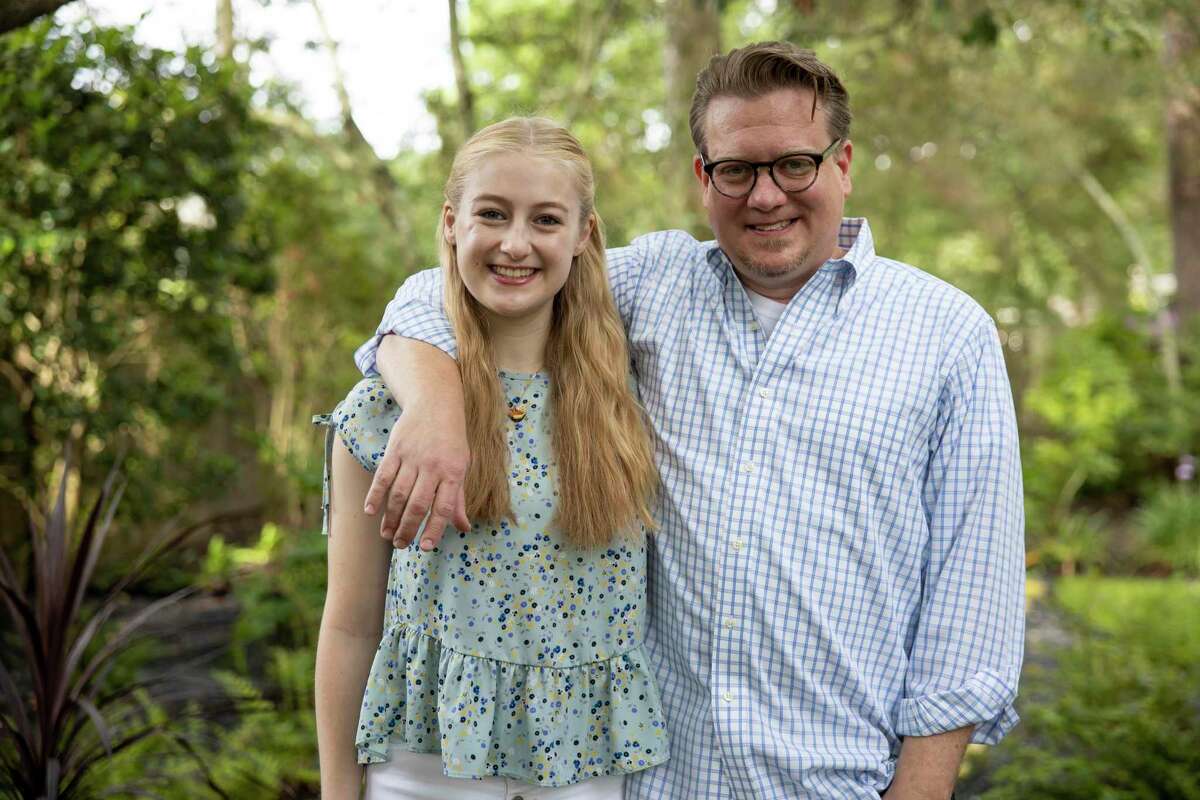 Ellie Peterson, left poses for a portrait with her dad, Matt Paterson, near their home in The Woodlands, Tuesday, July 7, 2020. Ellie Peterson, a John Cooper School graduate, was awarded the Insperity Scholarship and was nominated by her dad.