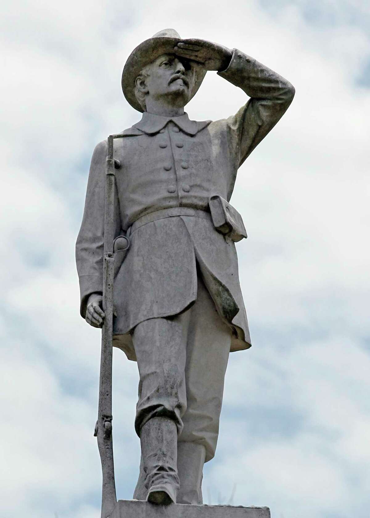 The statue of a rebel soldier has looked steadfastly northward from his sentry post atop a tall pedestal in a Gonzales park since 1909. Some now want it removed.