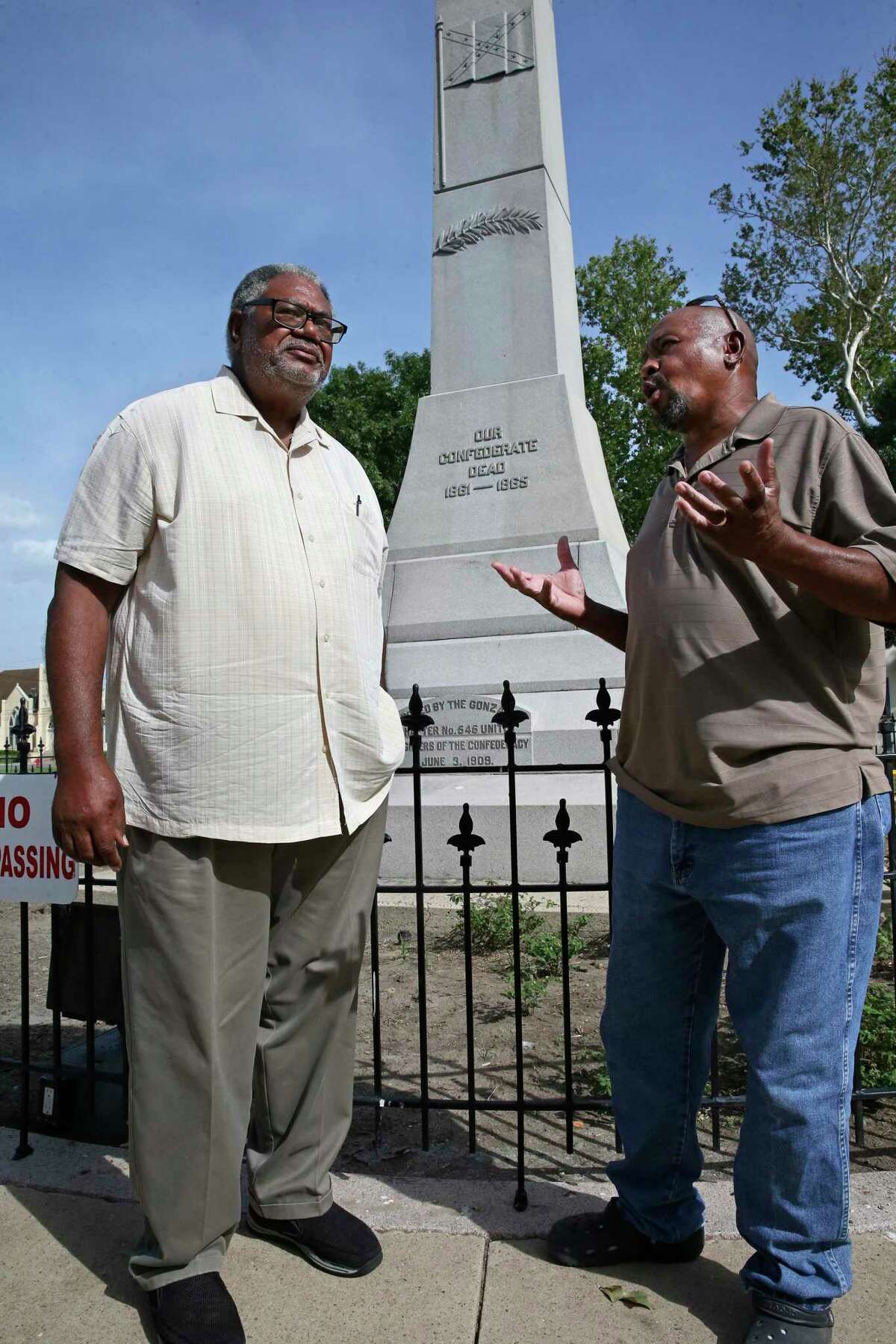 Gonzales residents David Tucy, left, and Quincy Johnson say change is long overdue for Confederate Square.