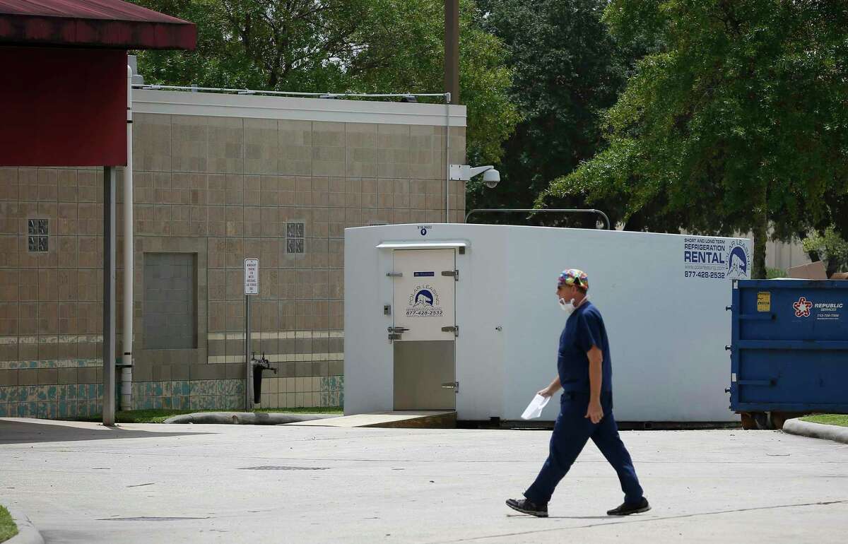 A refrigerated trailer was rolled into a loading area at HCA Healthcare Northwest when that hospital's morgue became full after a surge of COVID-19 deaths. Photographed July 1, in Houston.