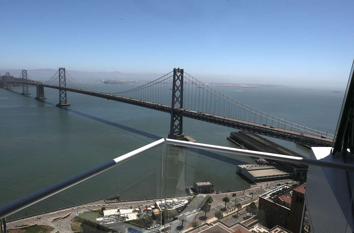 View of the bridge seen from a patio deck at Jeannie Gang's tower Mira on Tuesday, June 30, 2020, in San Francisco, Calif.