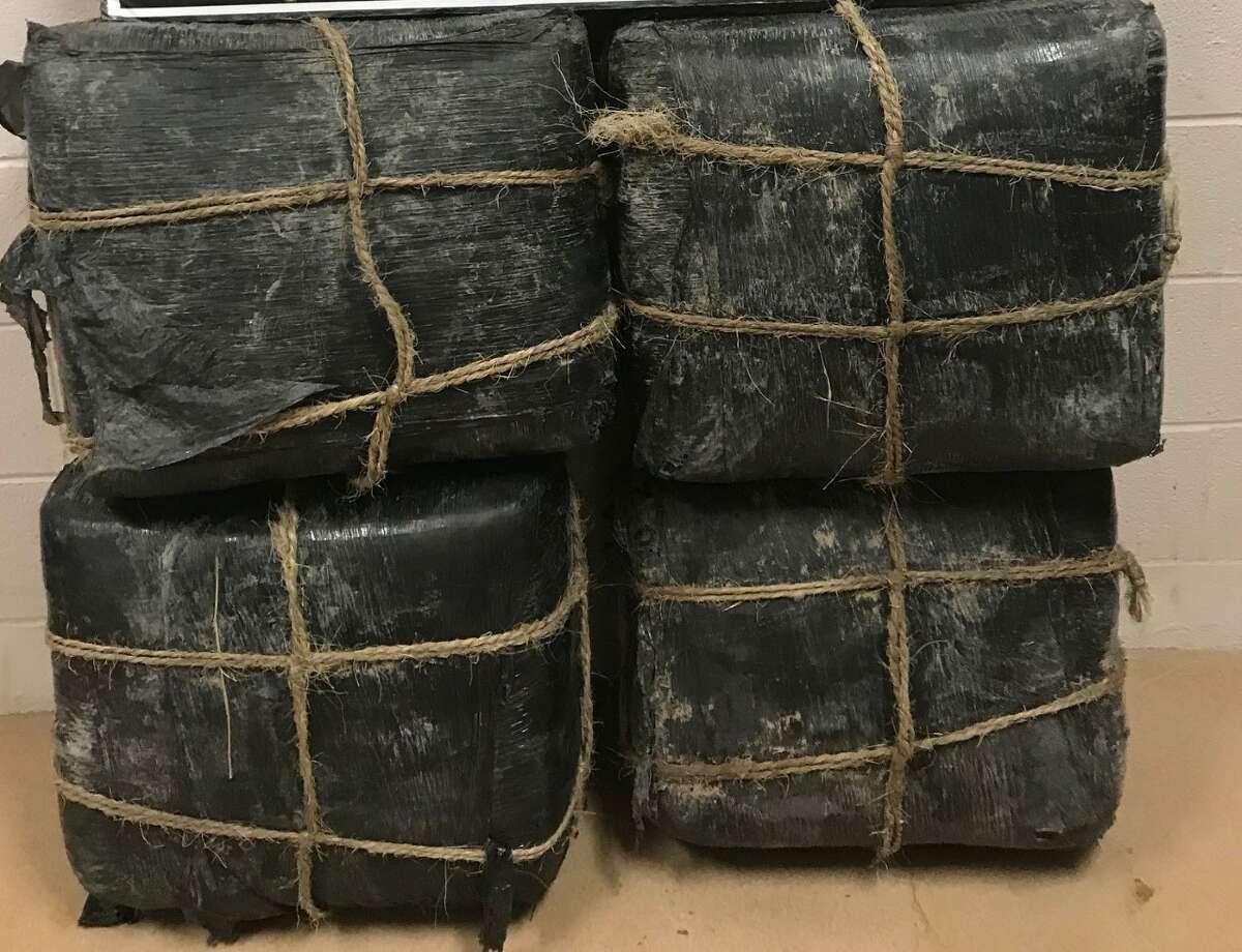 More than $150,000 in marijuana is pictured after it was recovered after a drug smuggler tried to pose as a golfer at the Max A. Mandel Golf Course.