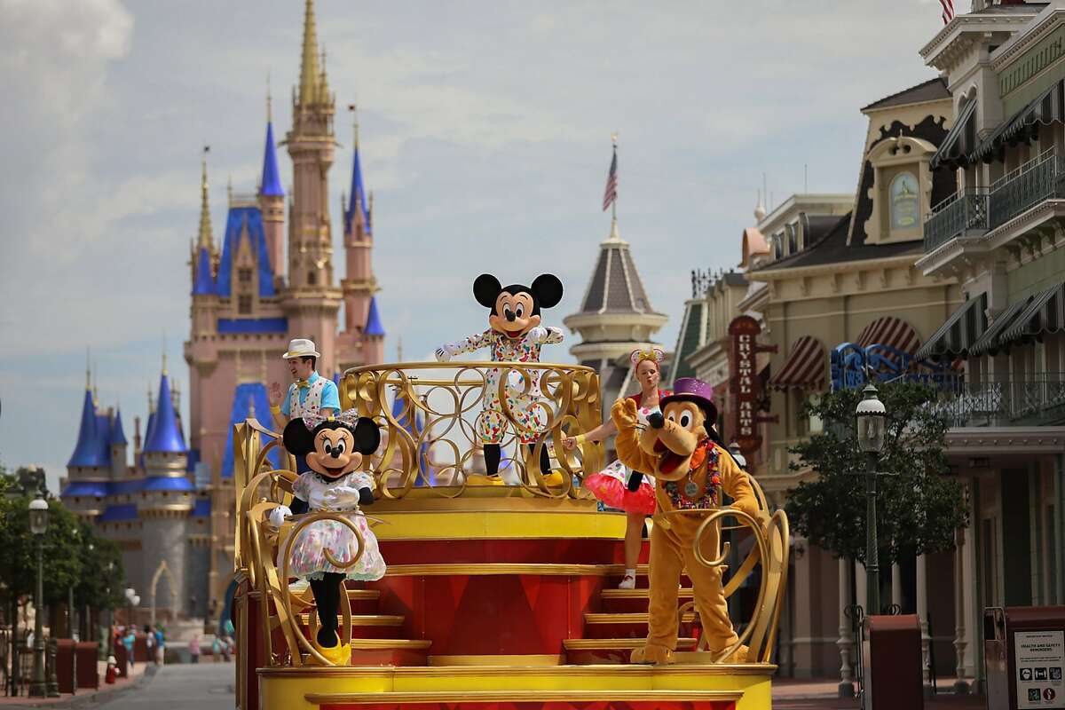 LAKE BUENA VISTA, FL - JULY 11: In this handout photo provided by Walt Disney World Resort, Mickey Mouse will star in the "Mickey and Friends Cavalcade" when Magic Kingdom Park reopens on July 11, 2020 in Lake Buena Vista, Florida. With traditional parades on temporary hiatus to support physical distancing during the parks phased reopening, Disney characters will pop up in new and different ways throughout the day. (Photo by Kent Phillips/Walt Disney World Resort via Getty Images)