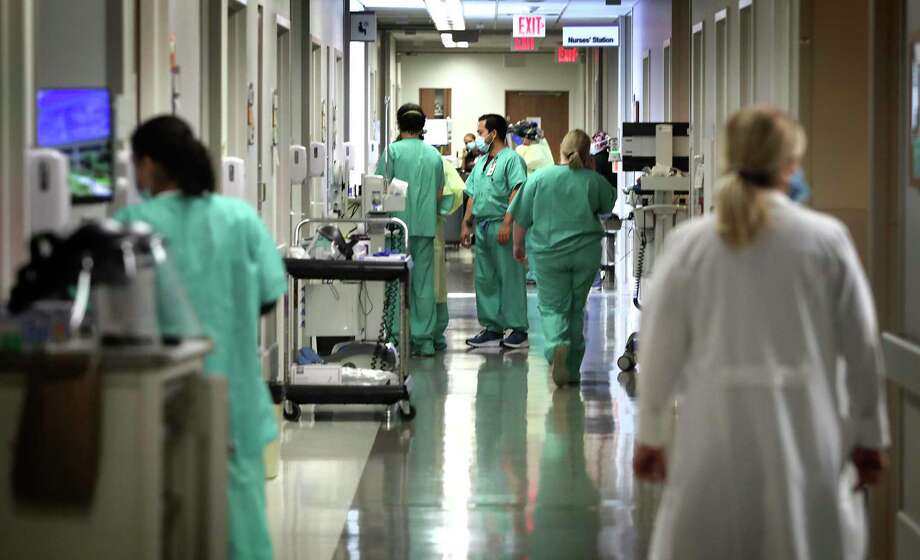 At University Hospital, where the hallways are busy with nurses and other staff, more space and resources have been set aside to handle the skyrocketing number of coronavirus infections that started in June. Photo: Bob Owen /Staff Photographer / ©2020 San Antonio Express-News
