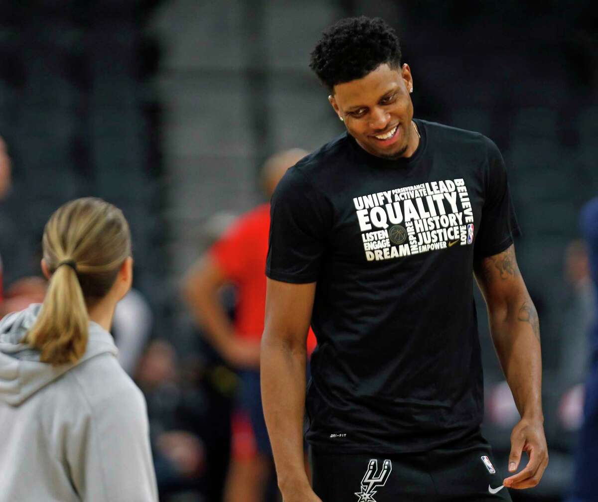 SAN ANTONIO, TX - FEBRUARY 2: Rudy Gay #22 of the San Antonio Spurs shares a light moment with assistant coach Becky Hammon before the start of their game against the New Orleans Pelicans at AT&T Center on February 2, 2019 in San Antonio, Texas. NOTE TO USER: User expressly acknowledges and agrees that , by downloading and or using this photograph, User is consenting to the terms and conditions of the Getty Images License Agreement. (Photo by Ronald Cortes/Getty Images)