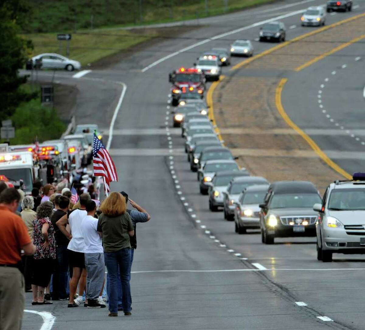 The casket carrying the remains of Staff Sgt. Derek Farley is moved down Routes 9 and 20 in Schodack on August 25, 2010. (Skip Dickstein/Times Union)