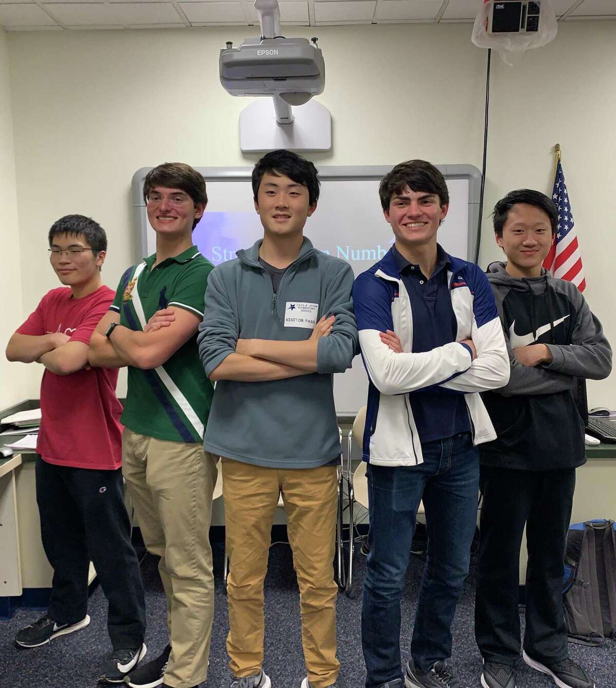 Marcus Feng, left, Jonathan Strong, Ming Wu, James Strong, Andrew Qin. Not pictured, Luke Smith. Darien High School seniors James Strong (president and co-founder) and Ming Wu (co-founder) have worked to bring fourth and fifth graders a program that pushes their minds while exciting them about the field of mathematics.