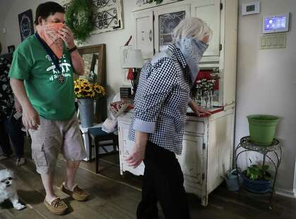 Shaun Dooley, left, a participant in the ARC's Adult Life Enrichment program, has found great satisfaction and meaningful relationships at the ARC, on Friday, May 22, 2020. Shaun lives with his mother Toni Dooley, right.