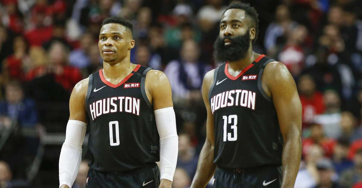 Houston Rockets guard Russell Westbrook (0) and guard James Harden (13) during the second half of an NBA basketball game at Toyota Center on Tuesday, Feb. 11, 2020, in Houston.