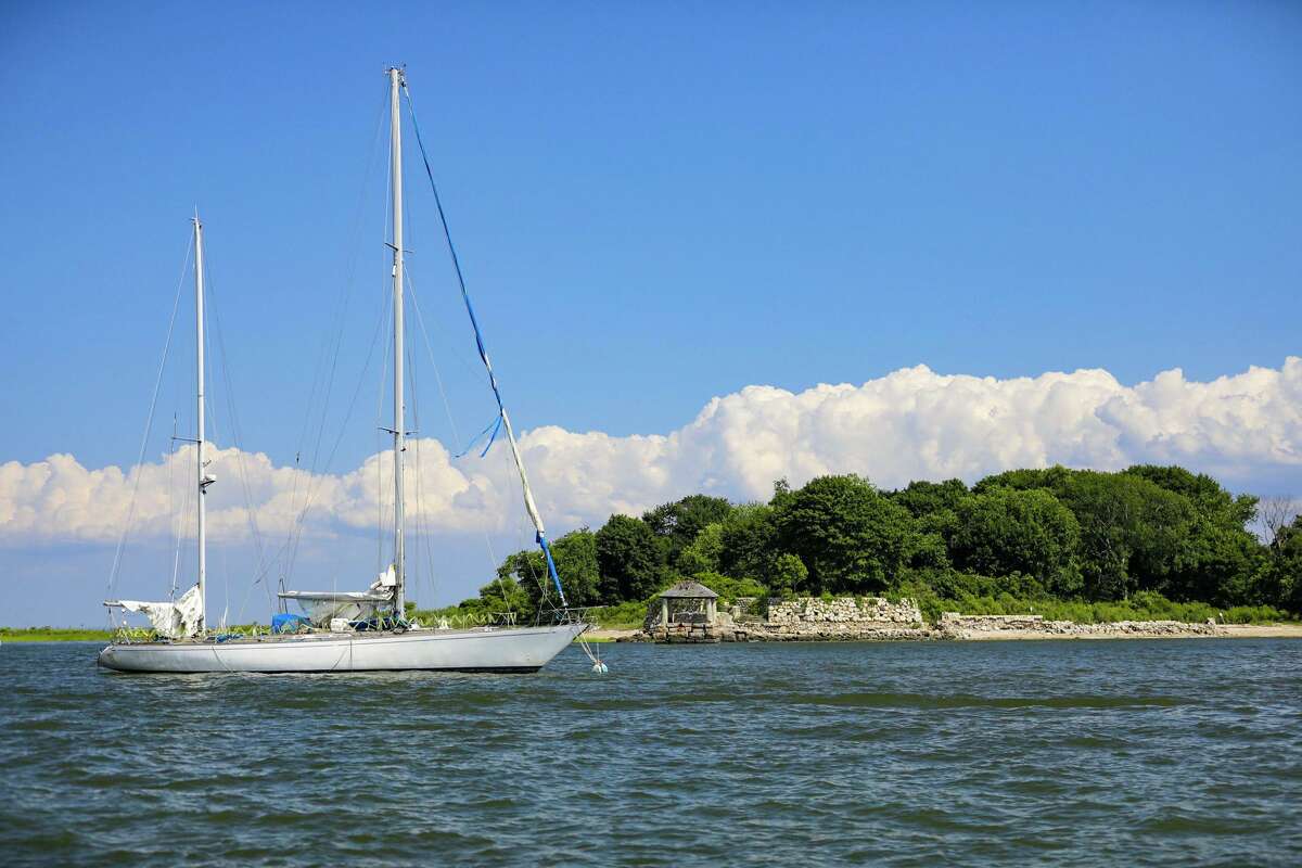 The Swany, a 72-foot sailboat, is at the center of a dispute between its owner, James Harding, and the city of Norwalk. City officials say they may take ownership of the boat, which has been moored off Sheffield Island for months, unless Harding finds a legal place to dock it.