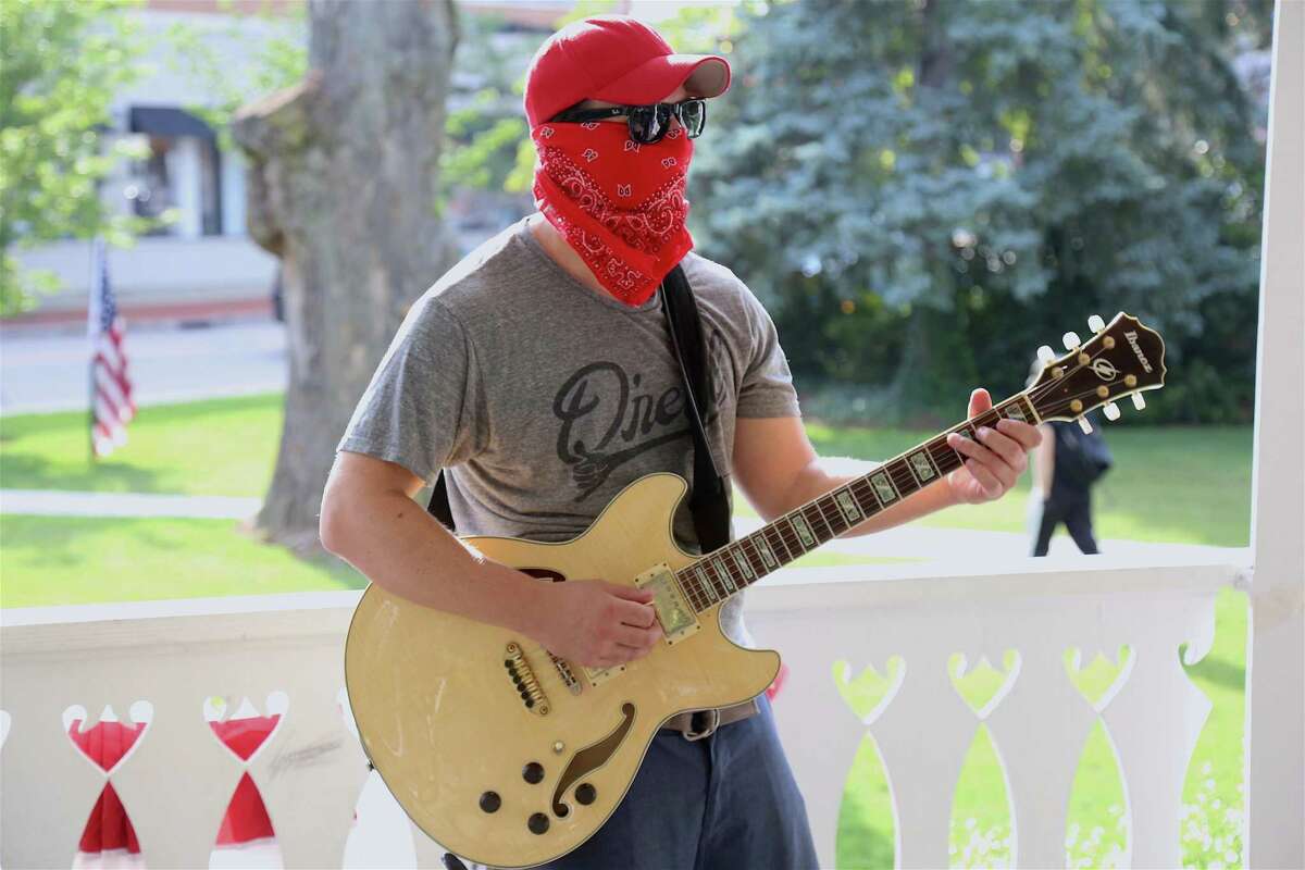 Guitarist Jeff Tavolacci of Fairfield gets ready to rock at this season's first Sherman Green Summer Concert on Saturday, July 11, 2020, in Fairfield, Conn.