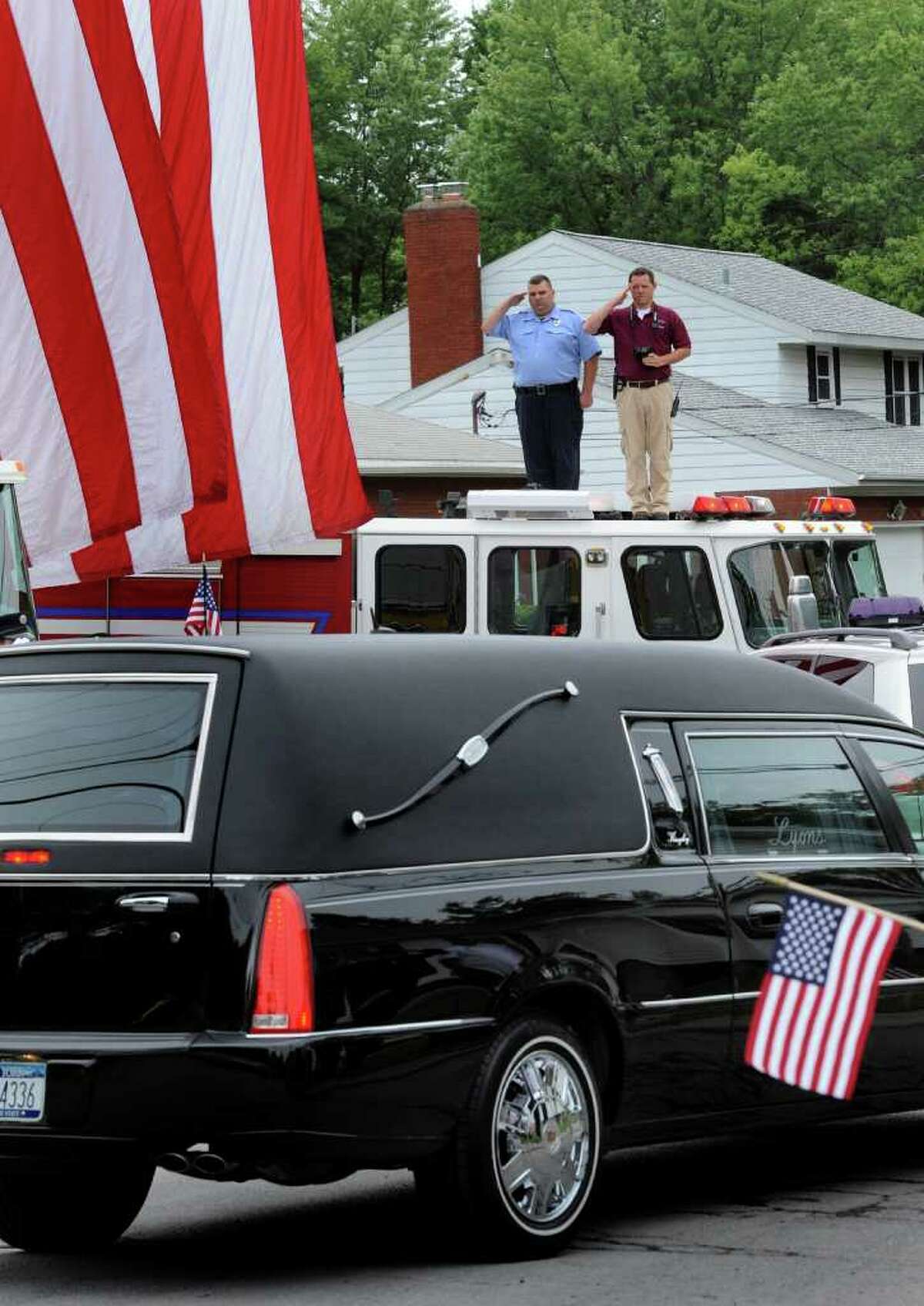 Village turns out to honor fallen GI