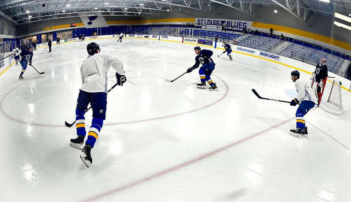 The Blues break during a scrimmage as they practice earlier this week at their practice facility in Maryland Heights.