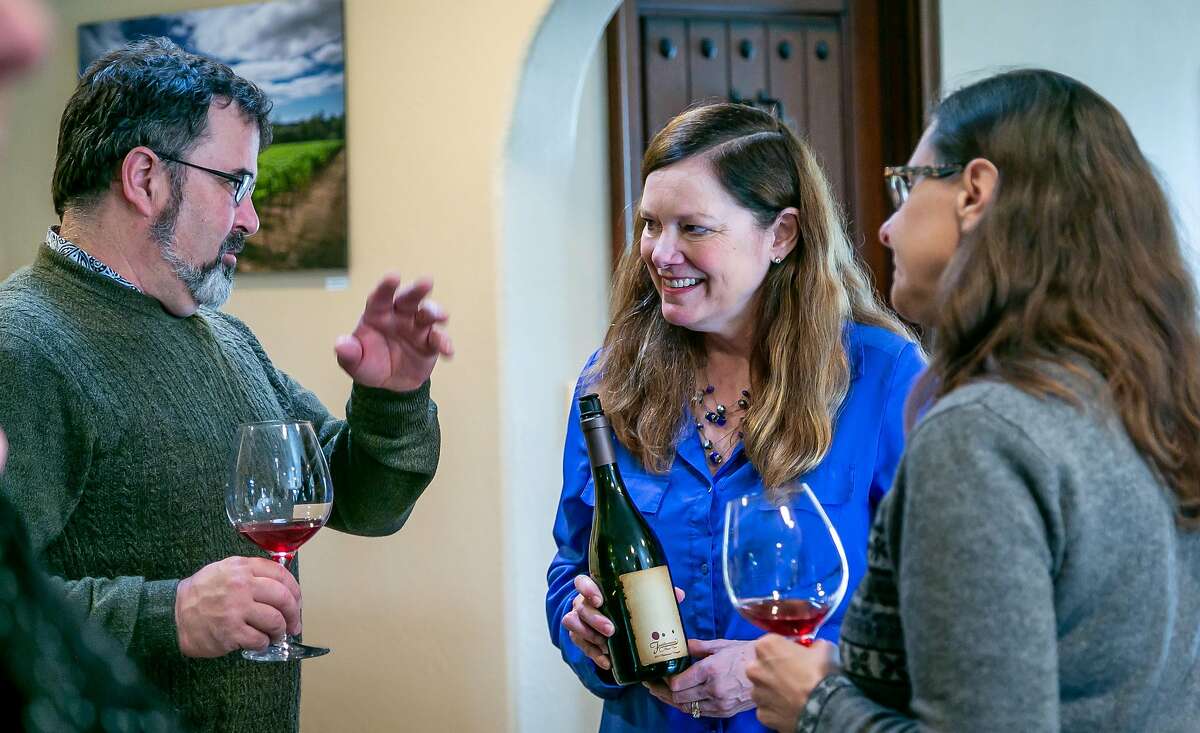Cindi Howley pours for Richard Vaughn and Liz Matchett at the Furthermore Winery tasting room in Sebastopol, Calif. on February 3rd, 2019.