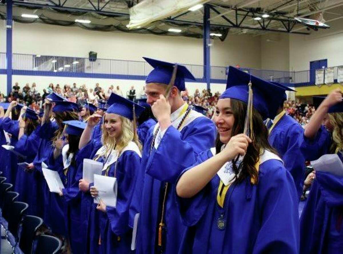 Morley Stanwood High School seniors flip their tassels during this 2017 commencement ceremony. This year, the ceremony will take place outdoors with social distancing enforced. (Pioneer file photo)