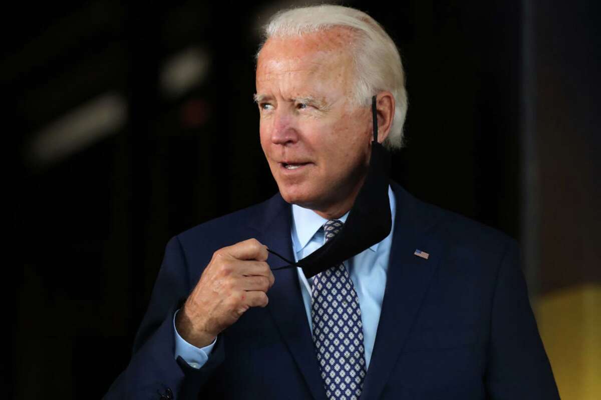 The presumptive Democratic presidential nominee Joe Biden walks on to stage as he speaks at McGregor Industries on July 9, 2020 in Dunmore, Pennsylvania. The former vice president, who grew up in nearby Scranton, toured a metal works plant in Dunmore in northeastern Pennsylvania and spoke about his economic recovery plan.