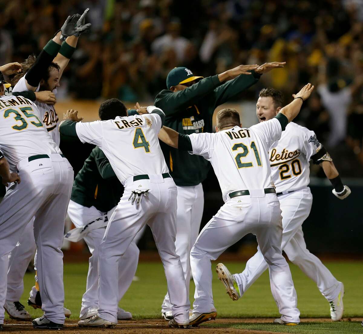 A's Josh Donaldson, (98) after hitting his first inning home run