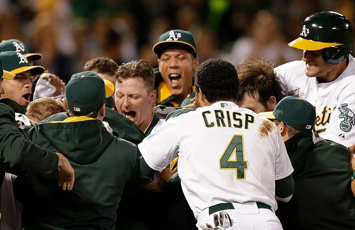 Oakland Athletics' Josh Donaldson celebrates as he rounds the