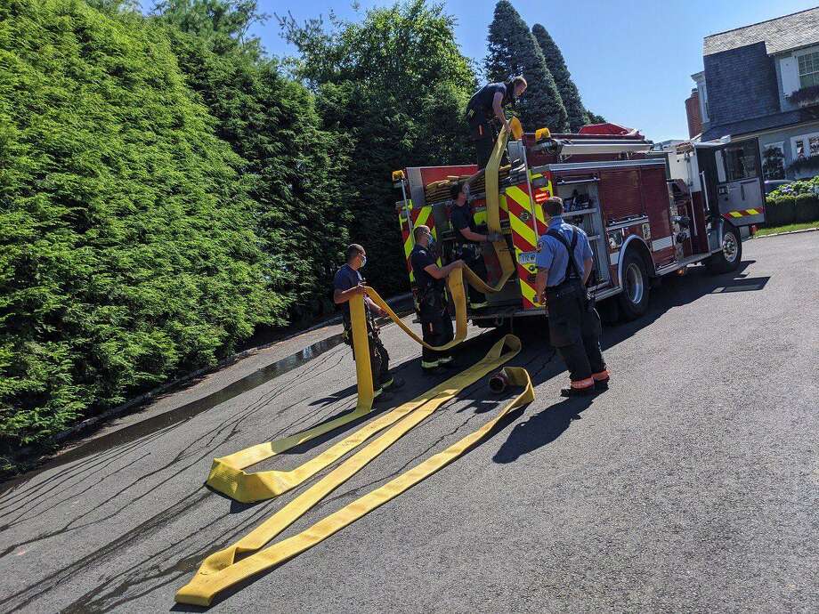 Crews on scene after a construction crew accidentally hit a main gas line in Westport, Conn., on Tuesday, July 14, 2020. Photo: Contributed Photo / Westport Police Department