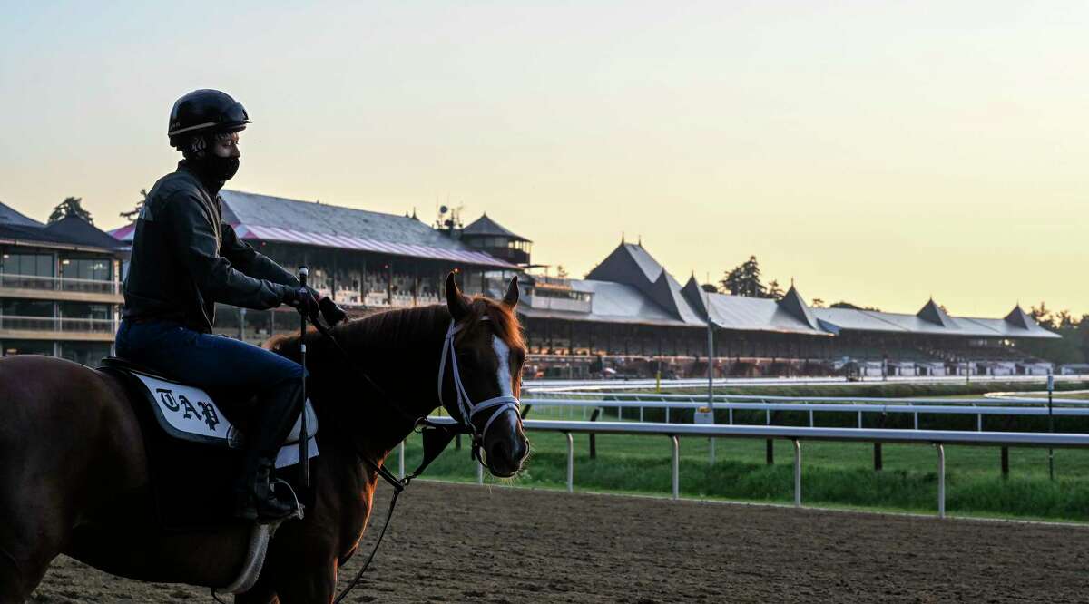 Exercise rider Adel Bellinger sits atop Lonely Party as she prepares to go out for a gallop in the early morning the day before opening day at Saratoga Race Course July 15, 2020 in Saratoga Springs, N.Y. Photo by Skip Dickstein/Special to the Times Union.