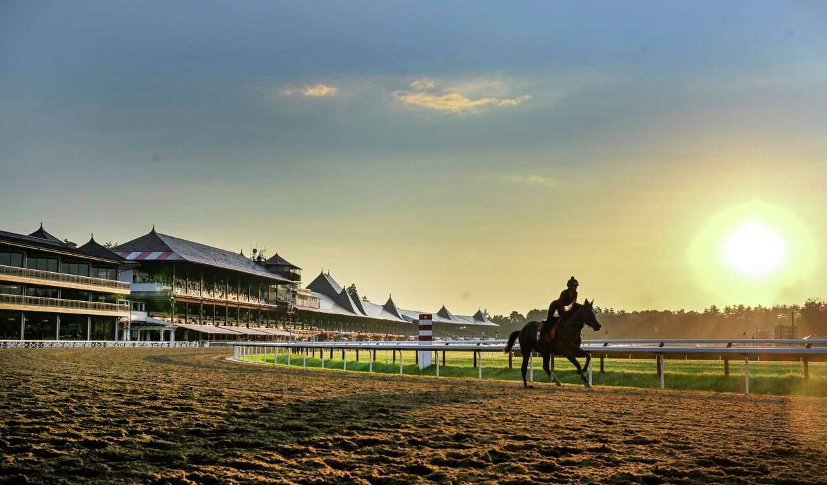 Horses gallop in the early morning the day before opening day at Saratoga Race Course July 15, 2020 in Saratoga Springs, N.Y. Photo by Skip Dickstein/Special to the Times Union