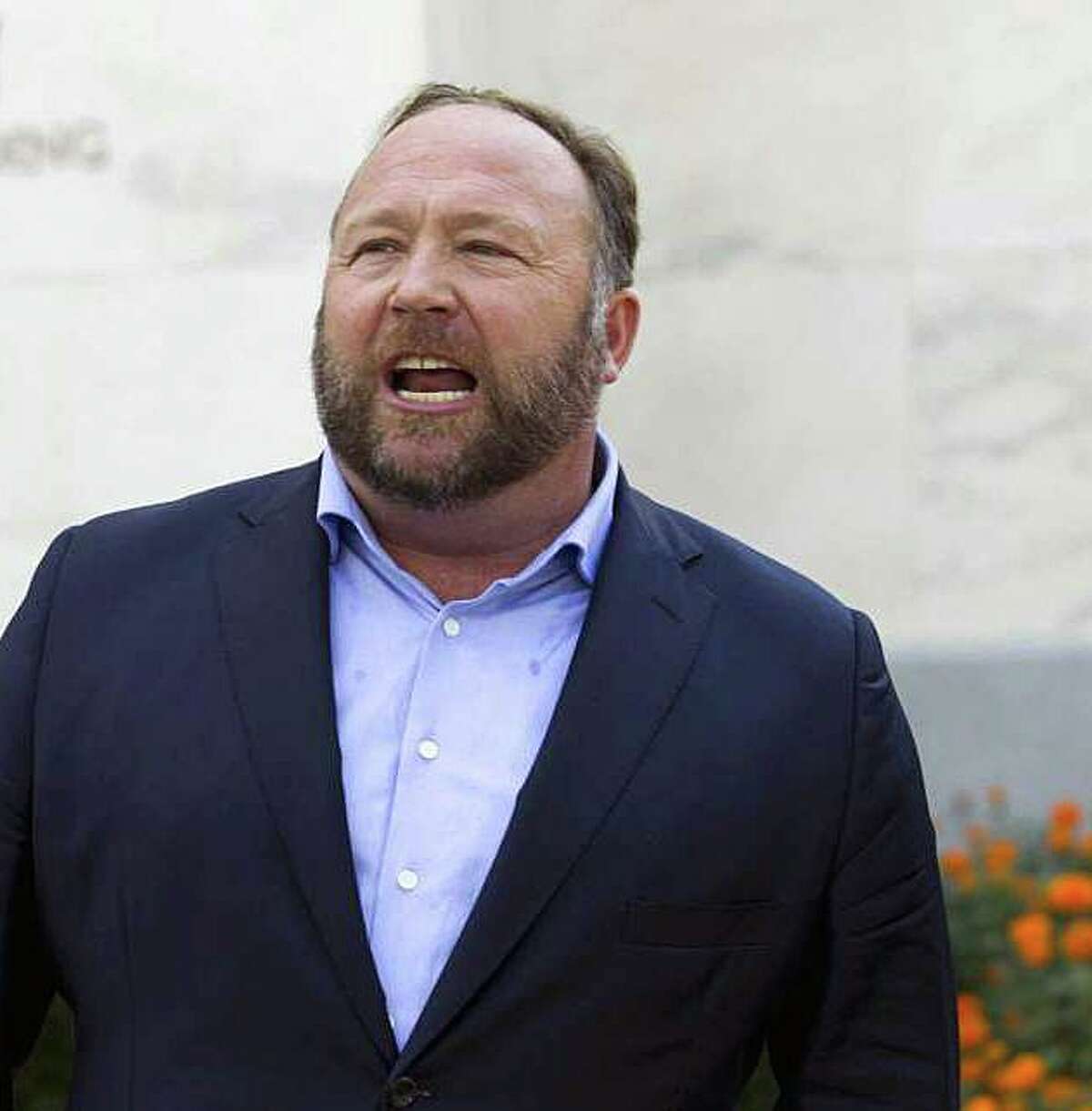 Conspiracy extremist Alex Jones speaks outside of the Dirksen building of Capitol Hill on Wednesday, Sept. 5, 2018, in Washington.