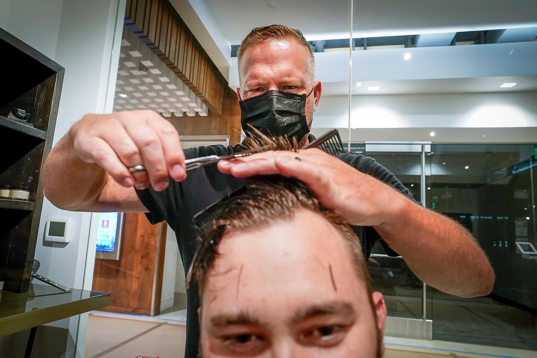 California barbershops and salons can open outside, but challenges await