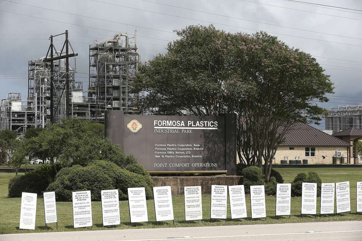Air quality renewal permits dot the entrance to the Formosa Plastics plant in Point Comfort across the bay from Port Lavaca, Texas, Wednesday, June 28, 2017. Local activists say that the plant has illegally dumped plastic pellets and sand into Lavaca Bay for over 15 years.
