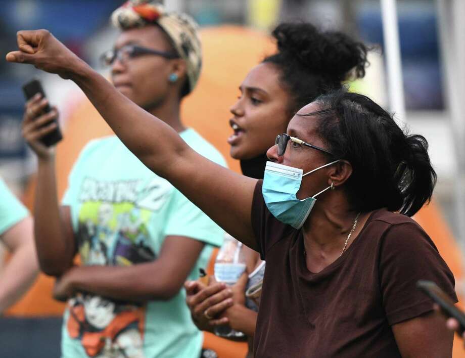 Steven Barrier's mother, Valerie Jaddo, chants her son's name while visiting the Latham Abolition Camp at Latham Park in Stamford, Conn. Tuesday, July 14, 2020. A group of protesters has been camped out at Latham Park since the weekend protesting the death of Steven Barrier, who died in police custody in October of 2019, and demanding reform from the local police department. Photo: Tyler Sizemore / Hearst Connecticut Media / Greenwich Time