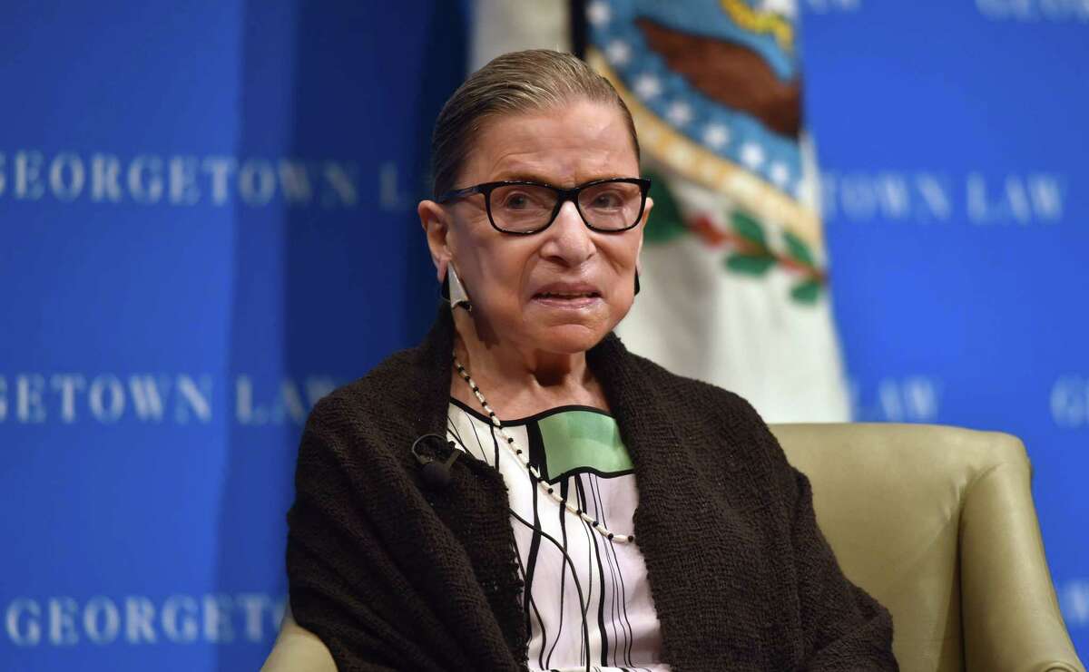 (FILES) In this file photo taken on September 20, 2017 US Supreme Court Justice Ruth Bader Ginsburg looks on as she speaks to first year Georgetown University law students in Washington, DC. - US Supreme Court Justice Ruth Bader Ginsburg, the 87-year-old anchor of its liberal faction, has been discharged from hospital on July 15, 2020 US media reported, after being hospitalized for a suspected infection on July 14. (Photo by Nicholas Kamm / AFP) (Photo by NICHOLAS KAMM/AFP via Getty Images)